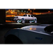 White LED Illuminated Wheel Rings on a truck in parking lot.