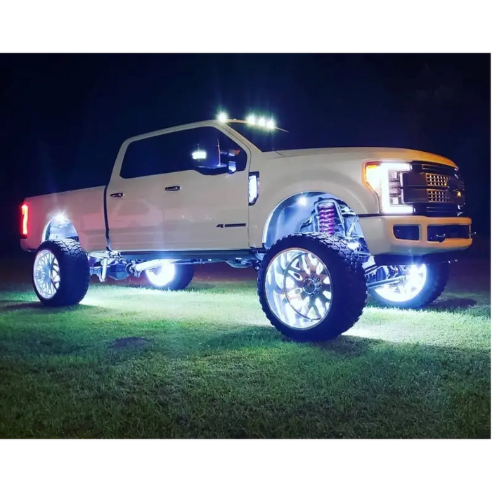 White Oracle LED Illuminated Wheel Rings on a truck