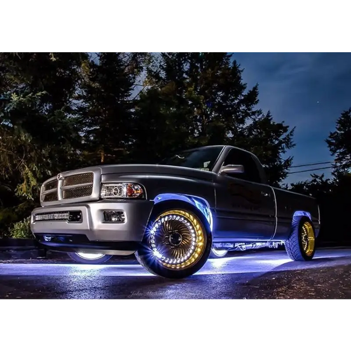 White Oracle LED Illuminated Wheel Rings on truck with side light