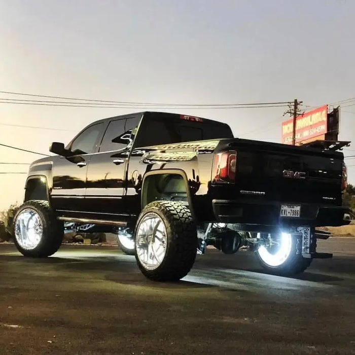 Oracle LED Illuminated Wheel Rings - White for Jeep Wrangler with truck bed lights.