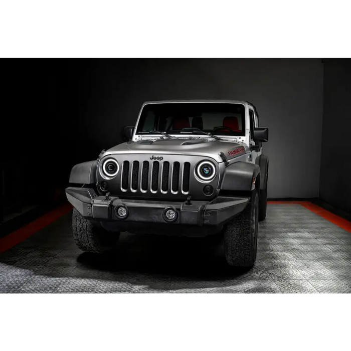 ORACLE Lighting 07-18 Jeep Wrangler JK Oculus 7in. Switchback Bi-LED Projector Headlights featuring the jeep shown.