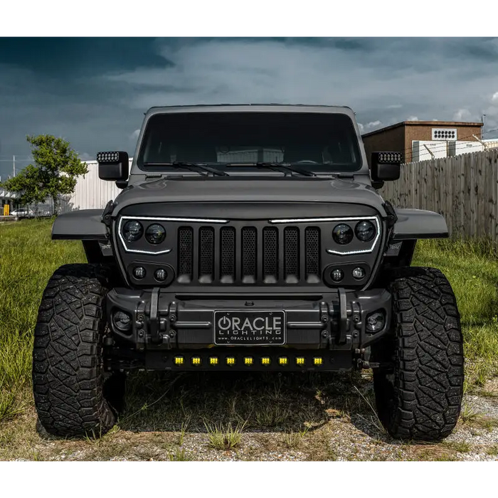 Black front end of a Jeep with skid plate and LED emitters from ORACLE Lighting.