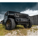 Jeep Wrangler JL parked in field with ORACLE Lighting skid plate and LED emitters.