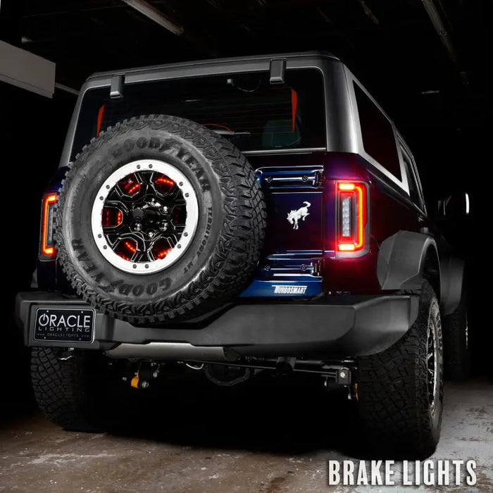 Close up of jeep with tire on back - Oracle Lighting LED taillights for Ford Bronco