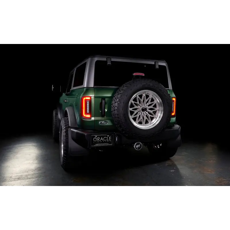 Oracle Lighting LED Tail Lights for Ford Bronco - Rear end of green jeep, black background