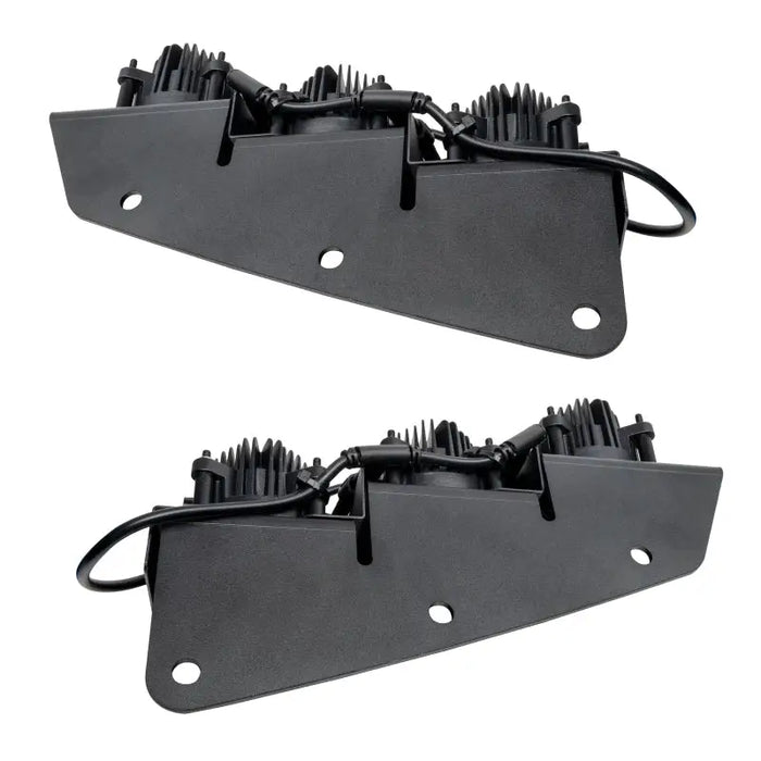 Black plastic brackets for front and rear fog light kit.