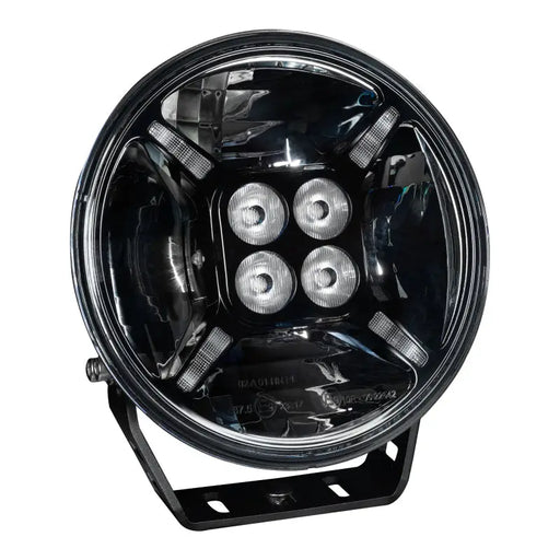 Oracle Lighting black LED headlight with white light beam pattern for Jeep Wrangler.