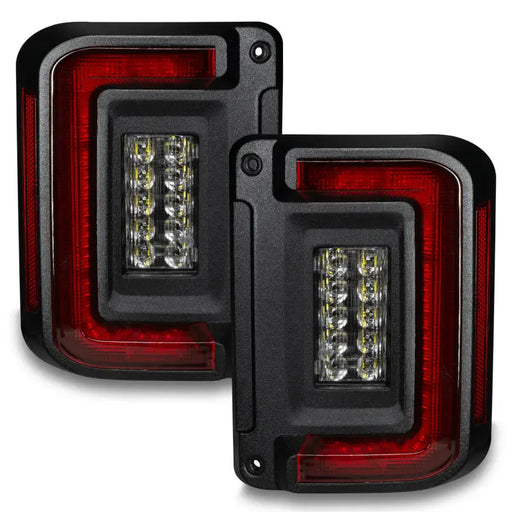 Pair of black LED tail lights for Ford F-150 by Oracle Lighting with flush mount LED design