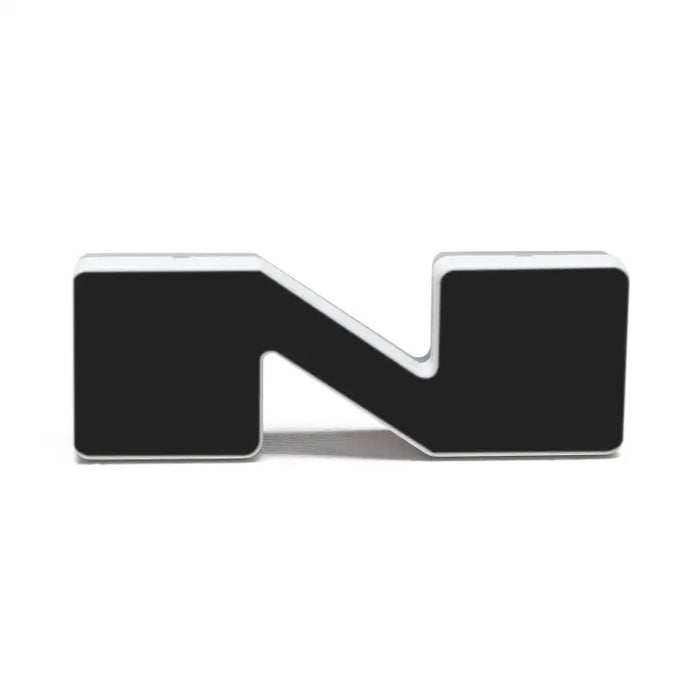 Black N logo illuminated LED letter badges on white background - Oracle Lighting Universal.