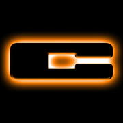 Glowing orange light LED letter badges in dark - ORACLE Lighting C