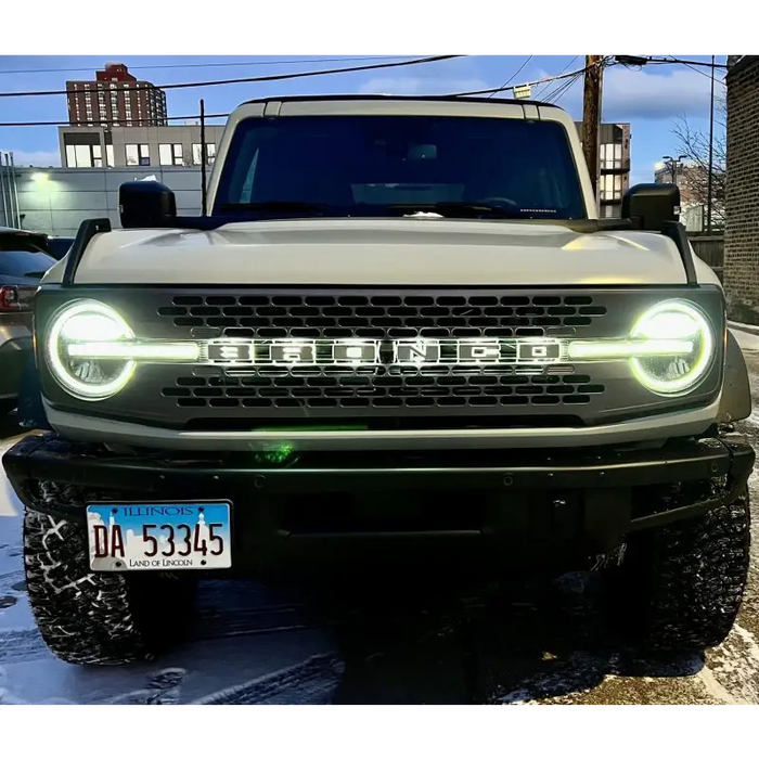 White truck with illuminated LED badge from ORACLE Lighting, featuring matte white surface finish - C.