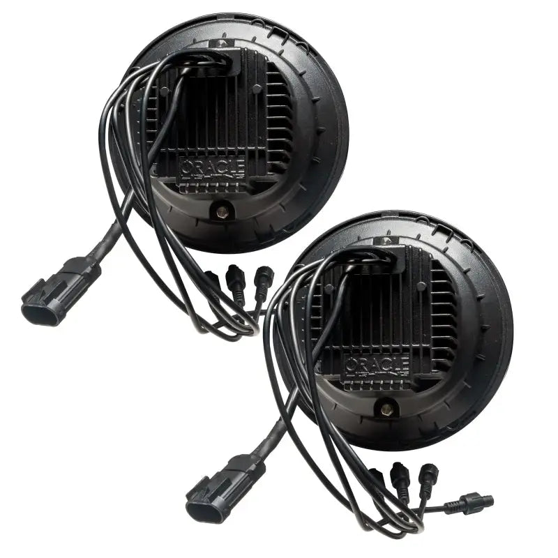 Pair of black RGB+W LED headlights for Jeep Wrangler JK with colorshift controller.