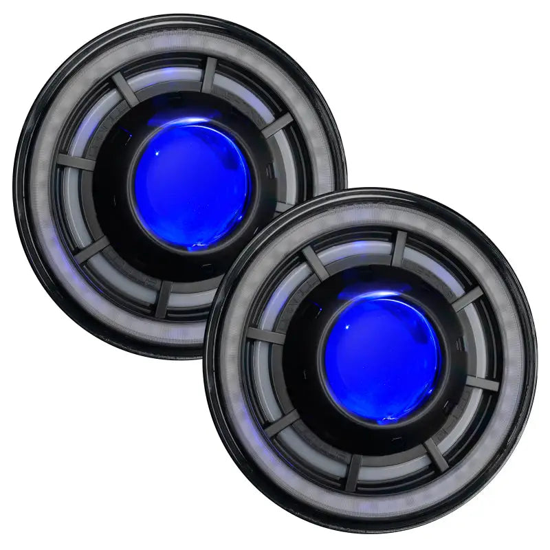 Oracle Oculus 7in ColorSHIFT Bi-LED Projector Headlights with Blue Lights on White Surface