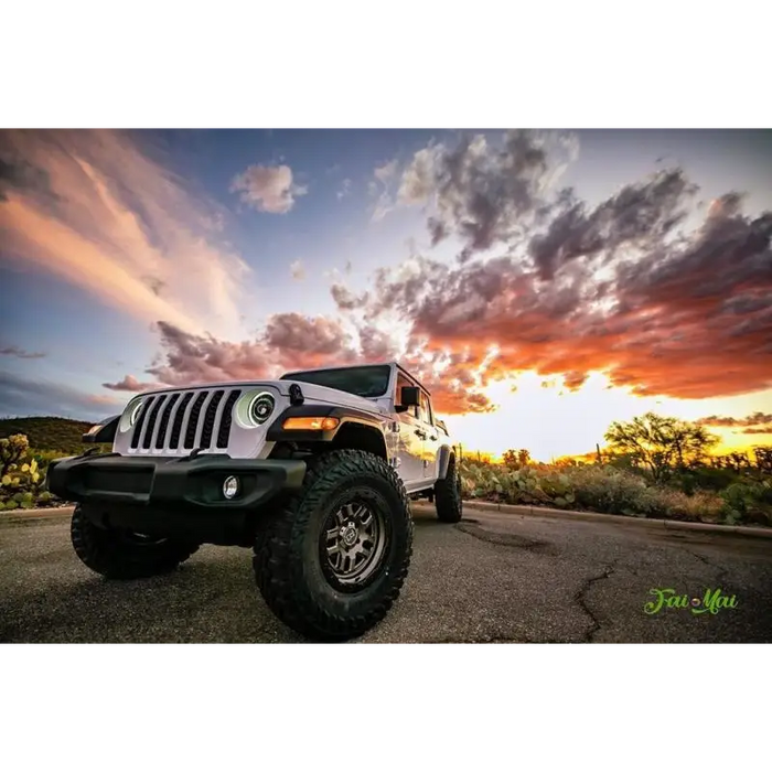 Oracle Oculus Bi-LED projector headlights for Jeep JL/Gladiator JT with sunset in background