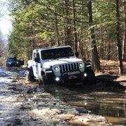 Jeep JL/Gladiator stuck in mud - Oracle Oculus Bi-LED projector headlights.