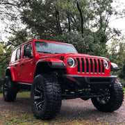 Red Jeep with Big Tire - Oracle Oculus Bi-LED Projector Headlights for Jeep JL/Gladiator JT