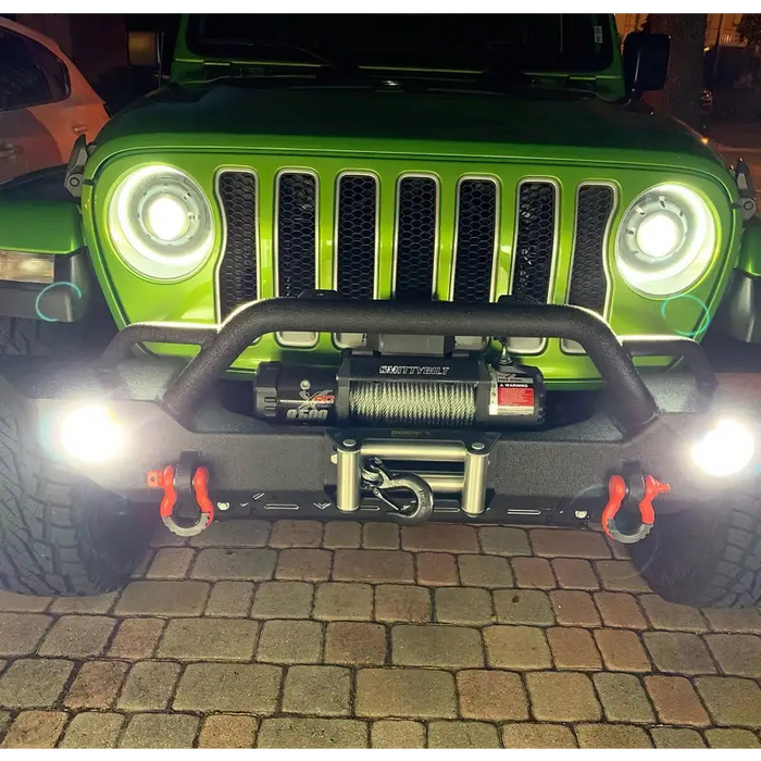 Green Jeep with winch, fitted with Oracle Oculus Bi-LED Projector Headlights for Jeep JL/Gladiator JT.