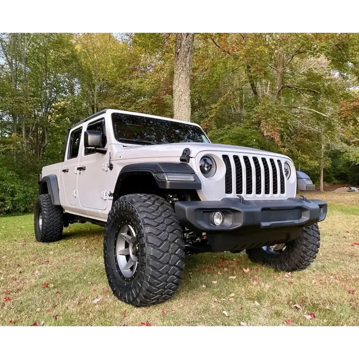 Close up of Jeep with Oracle Oculus Bi-LED Projector Headlights in field.