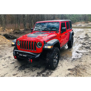 Red Jeep driving through mud with Oracle Oculus Bi-LED projector headlights for Jeep JL/Gladiator JT