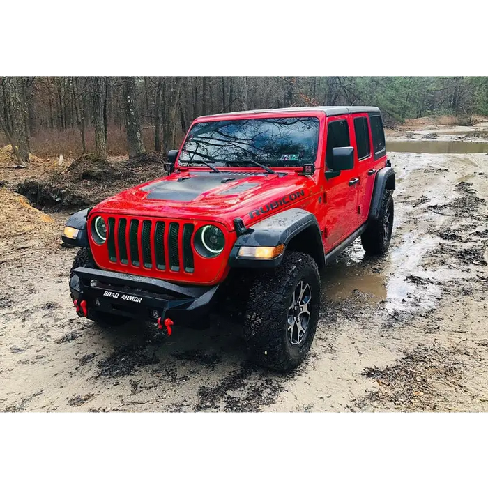 Red Jeep driving through mud with Oracle Oculus Bi-LED projector headlights for Jeep JL/Gladiator JT