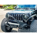 Close up of Jeep with large tire, Oracle Oculus Bi-LED Projector Headlights in Matte Black