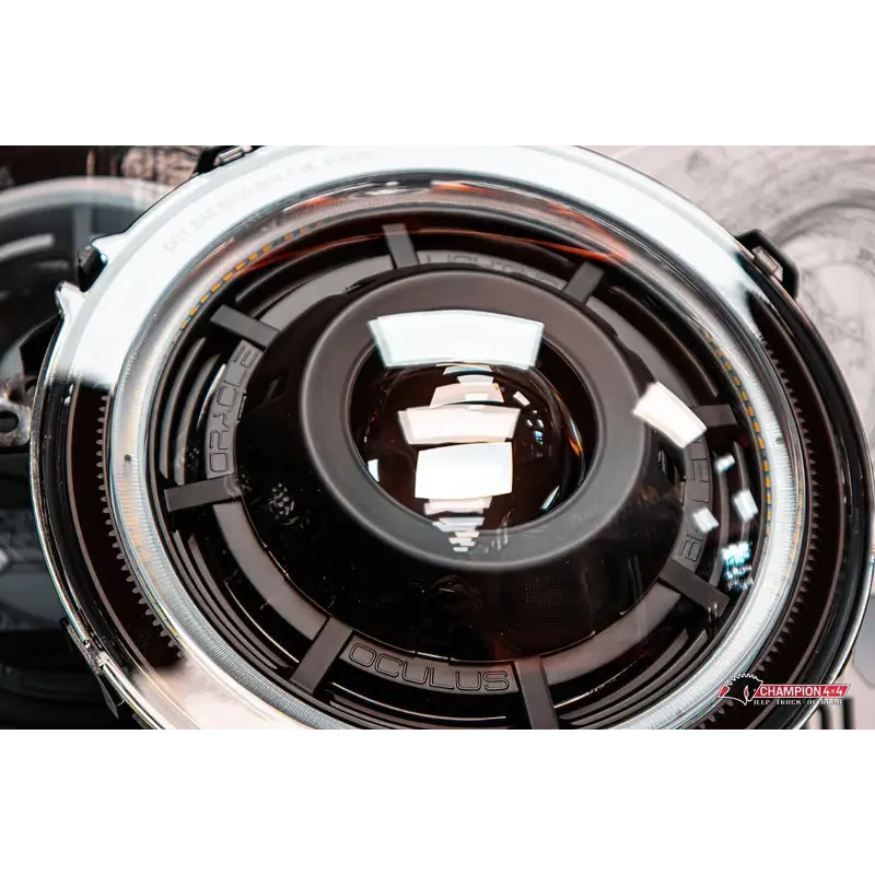 Oracle Oculus Bi-LED Projector Headlights attached to lens on Jeep JL/Gladiator.