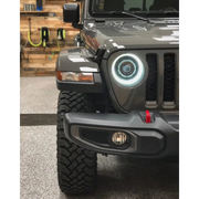 Oracle Oculus Bi-LED projector headlights for Jeep JL/Gladiator JT with LED light bar.