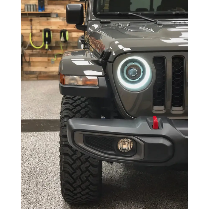 Oracle Oculus Bi-LED projector headlights for Jeep JL/Gladiator JT with LED light bar.