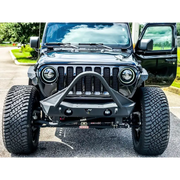 Close up of Jeep with big tire, Oracle Oculus Bi-LED Projector Headlights for Jeep JL/Gladiator JT - Matte Black - 5500K.