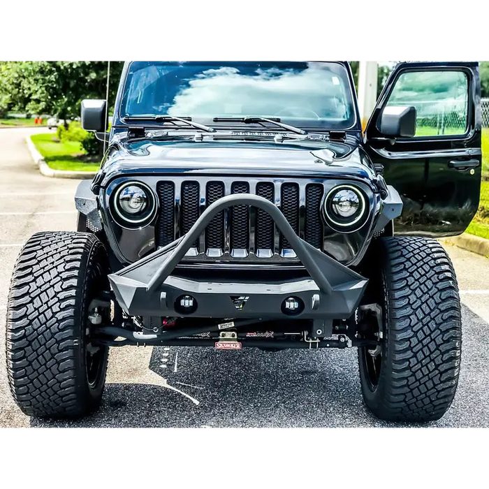 Close up of Jeep with big tire, Oracle Oculus Bi-LED Projector Headlights for Jeep JL/Gladiator JT - Matte Black - 5500K.