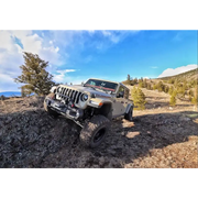 Off-road jeep driving on rocky trail - Oracle Oculus Bi-LED projector headlights for Jeep JL/Gladiator JT.