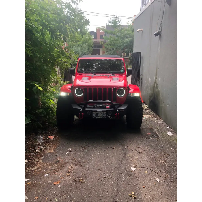 Red Jeep parked on road, Oracle Oculus Bi-LED projector headlights for Jeep JL/Gladiator JT - Matte Black