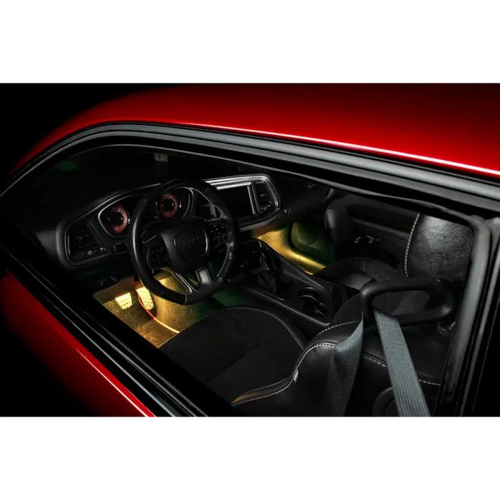 Interior of red car illuminated with Oracle Pair 15in LED Strips Retail Pack - RGB ColorSHIFT.