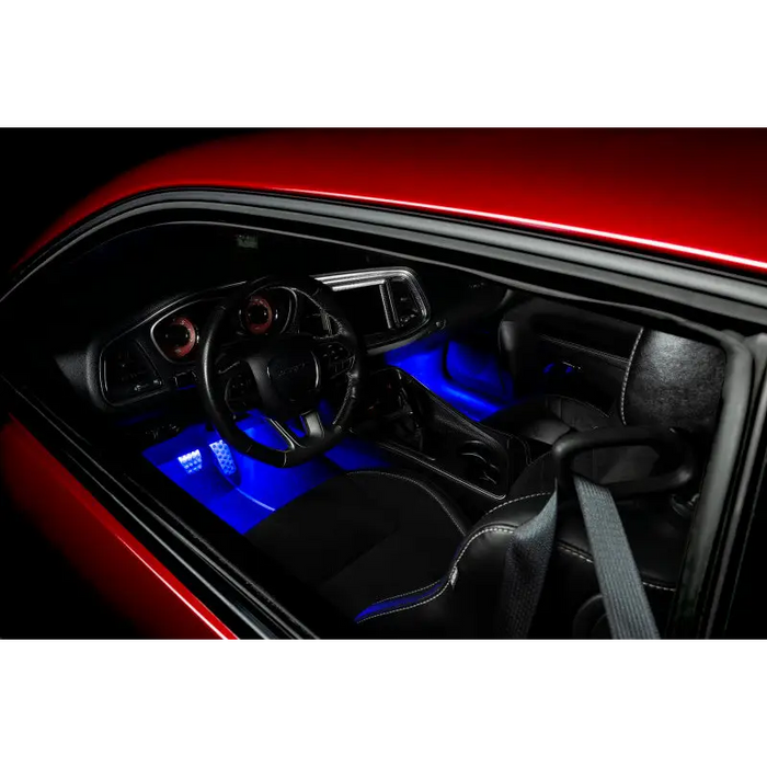 Red car interior with blue lights featuring Oracle Pair 15in LED Strips Retail Pack - RGB ColorSHIFT.