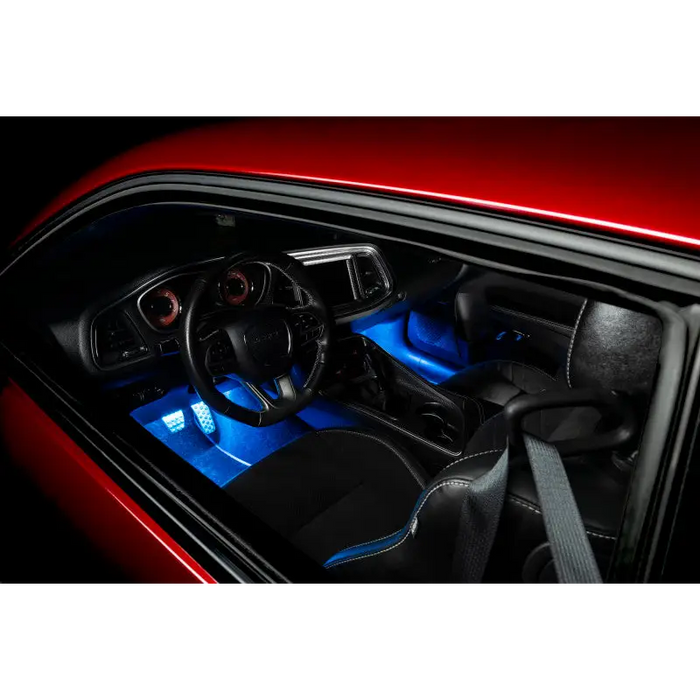 Interior of a red car illuminated by Oracle Pair 15in LED Strips Retail Pack - RGB ColorSHIFT.