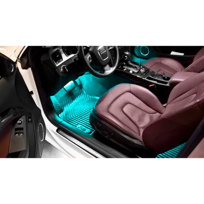 Interior of car with blue and brown leather illuminated by Oracle Pair 15in LED Strips - RGB ColorSHIFT for counter sales.