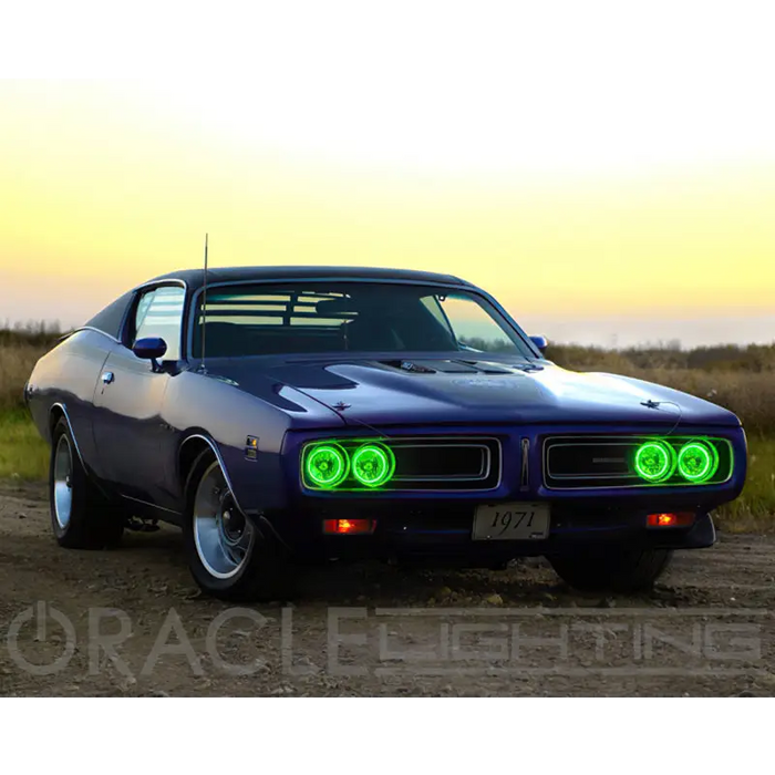 Blue 1970 Dodge Charger with green headlights lit up by Oracle Pre-Installed Sealed Beam ColorSHIFT Halo.