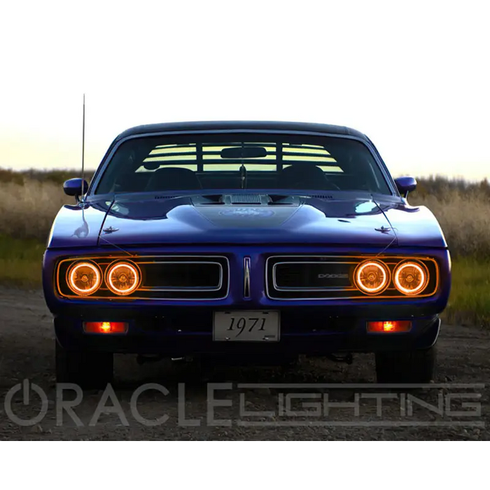 Blue Dodge Charger parked on dirt road - Oracle Pre-Installed Sealed Beam Halo Lights