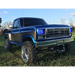 Blue truck parked in field with Oracle Pre-Installed Lights 7x6 IN. Sealed Beam - White Halo