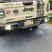 Jeep Gladiator with Jeep Sticker showcasing Oracle Rear Bumper LED Reverse Lights in 6000K