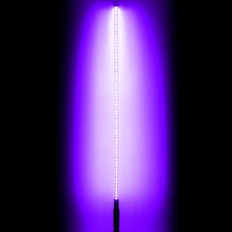 Oracle Off-Road ColorSHIFT LED Whip illuminating purple light in the dark.