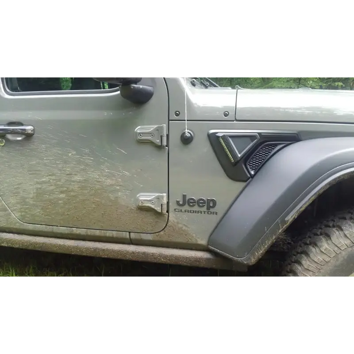 Close up of Jeep with mud on side, showcasing Oracle Sidetrack LED System for Jeep Wrangler JL/ Gladiator JT.