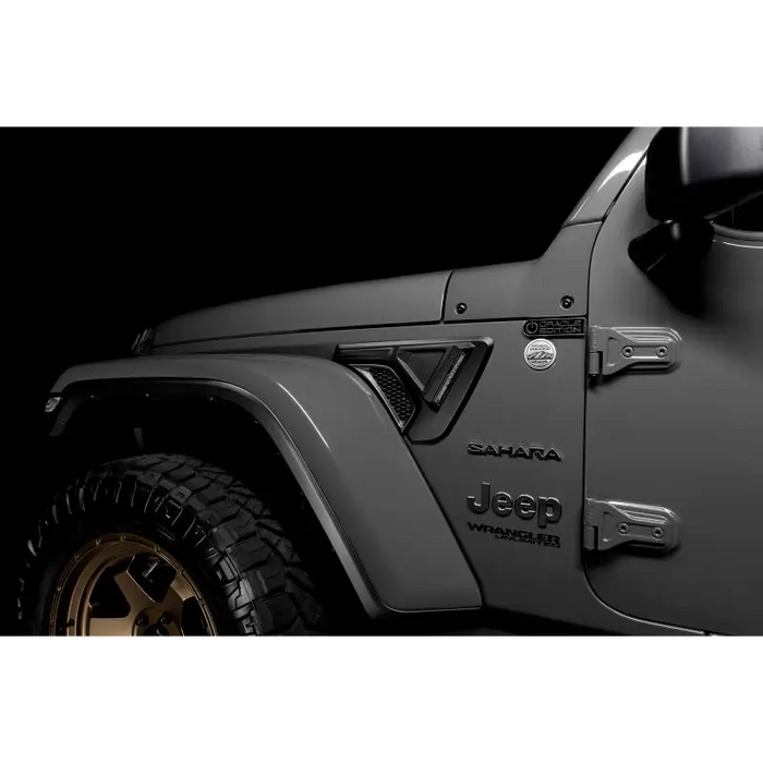 Black Jeep Wrangler with Oracle Sidetrack LED System and black tire cover