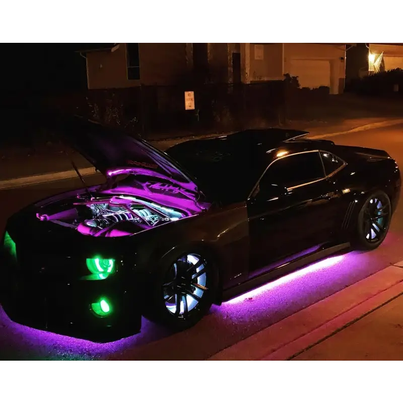 Dynamic ColorSHIFT LED underbody kit transforming car with purple lights, perfect for Jeep Wrangler.