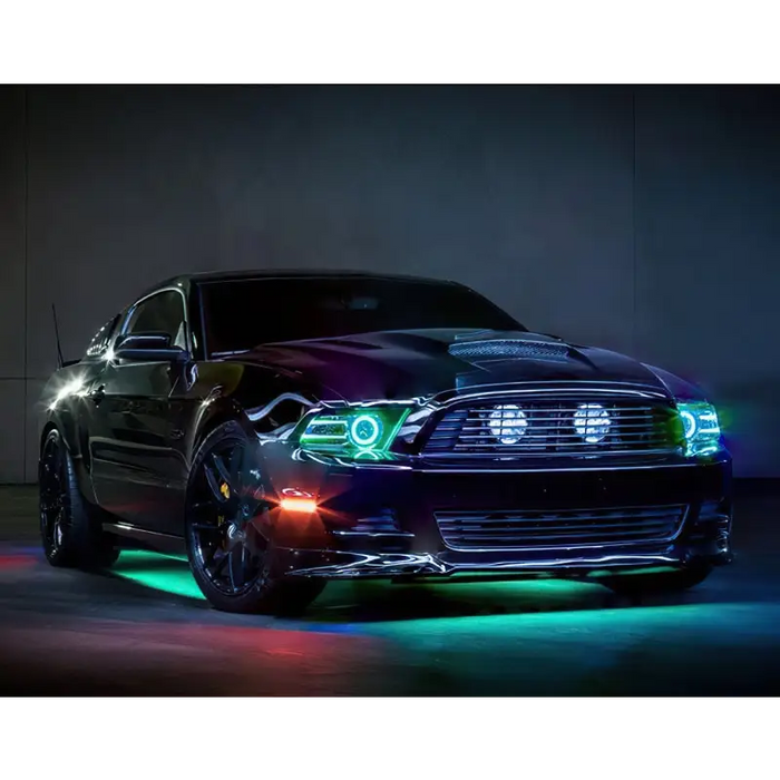 Dynamic ColorSHIFT LED Underbody Kit illuminating a car with green lights.