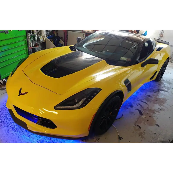 Yellow Corvette with black hood showcasing dynamic colorshift car lights