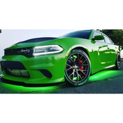 Green car with black rims and red brake pads, Oracle Universal LED Underbody Kit - ColorSHIFT for car lights.