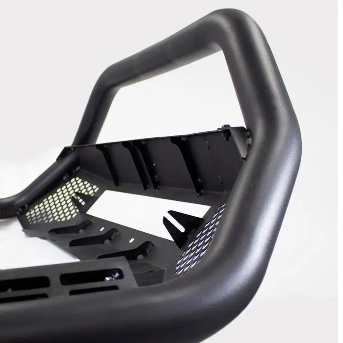 Close up of black bumper with light on - RC4 LR Frame skid plate for Jeep Wrangler and Ford Bronco.