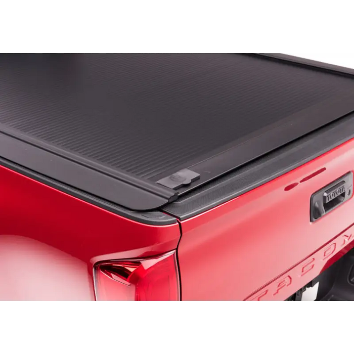 Red truck with black bed cover - RetraxONE MX features, Jeep Wrangler, Ford Bronco