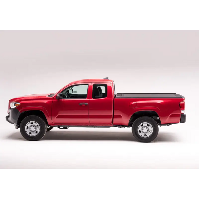 Red truck with white background, Retrax 16-18 Tacoma 5ft Double Cab RetraxONE MX.